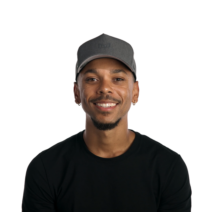 The model-image of melin's Odysea Hydrolite snapback hat in Heather Charcoal