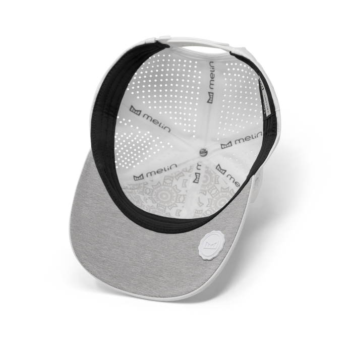 The inside view of melin's Odysea Hydrolite snapback hat in White