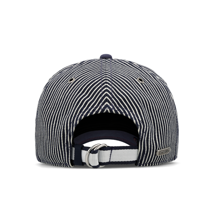 The back view of the melin Split Fit Odysea Mill Union hat in hickory denim