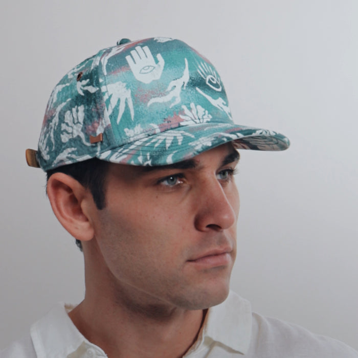 The model-image of the melin Split Fit Odysea Mill Visions hat in marine