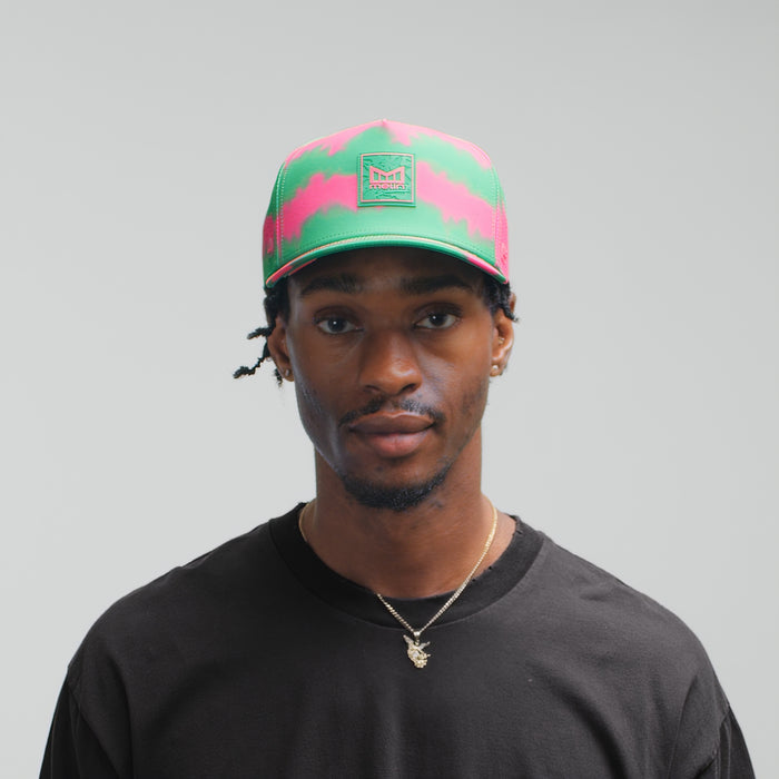 The model-image of melin Split Fit Odysea Neon Tie Dye Hydro Hat in Neo Pink