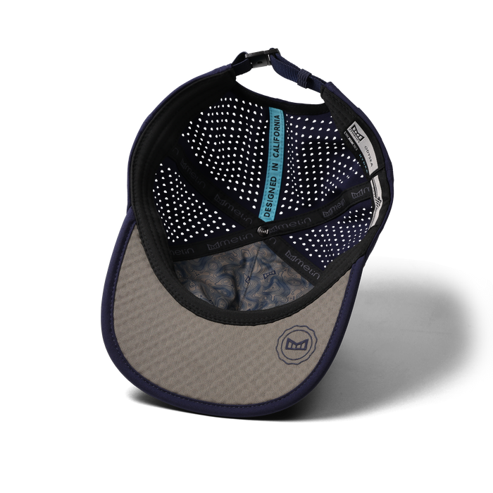 The inside view of the melin Odysea Packable Hydro Split Fit in Peacoat