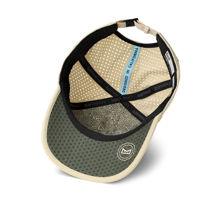 The inside view of the melin Split Fit Odysea Packable Hydro hat in sand