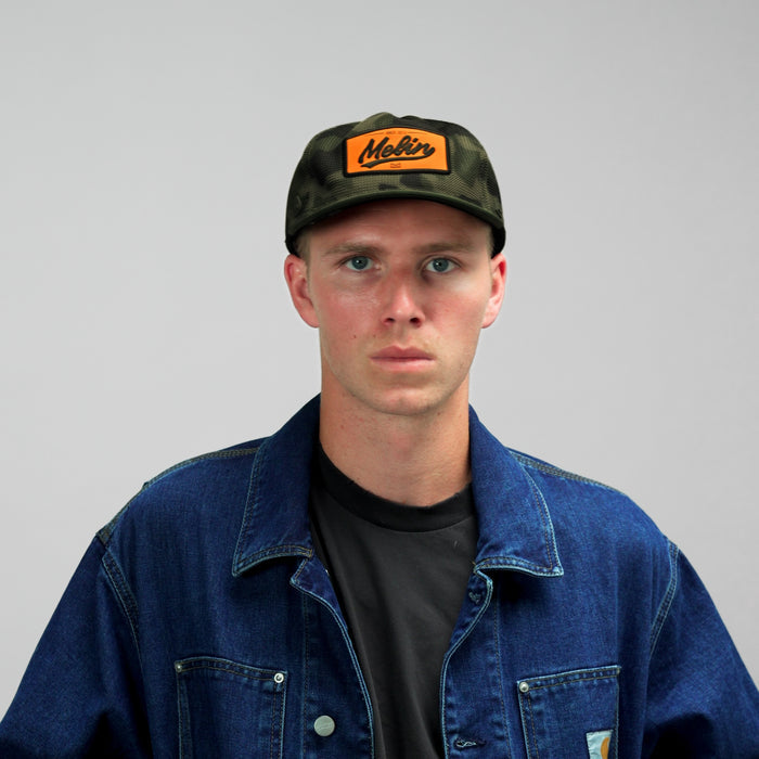 The model-image view of the melin Split Fit Odysea Retro hat in Olive Camo