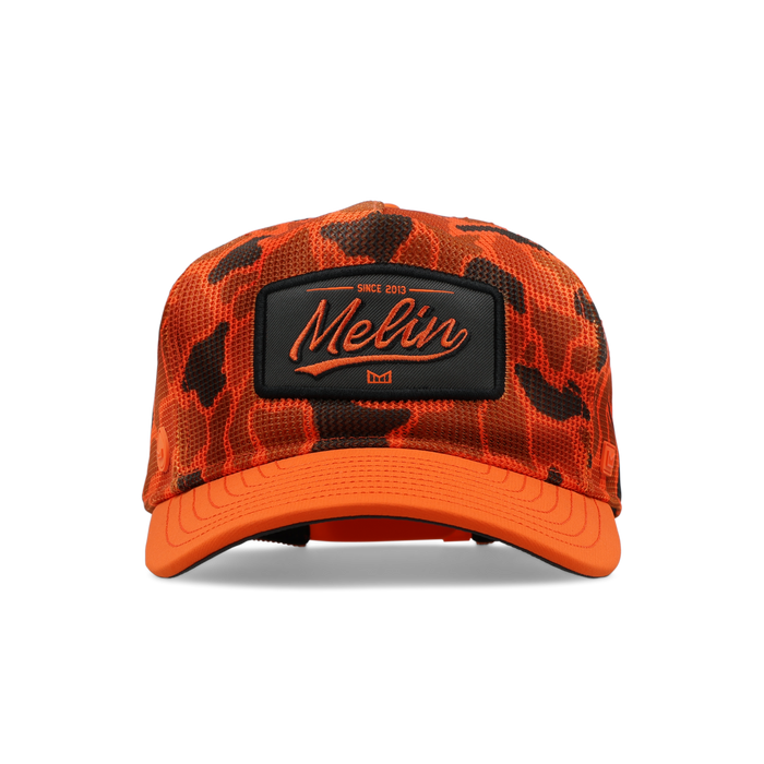 The frontal view of the melin Split Fit Odysea Retro Hydro hat in safety orange