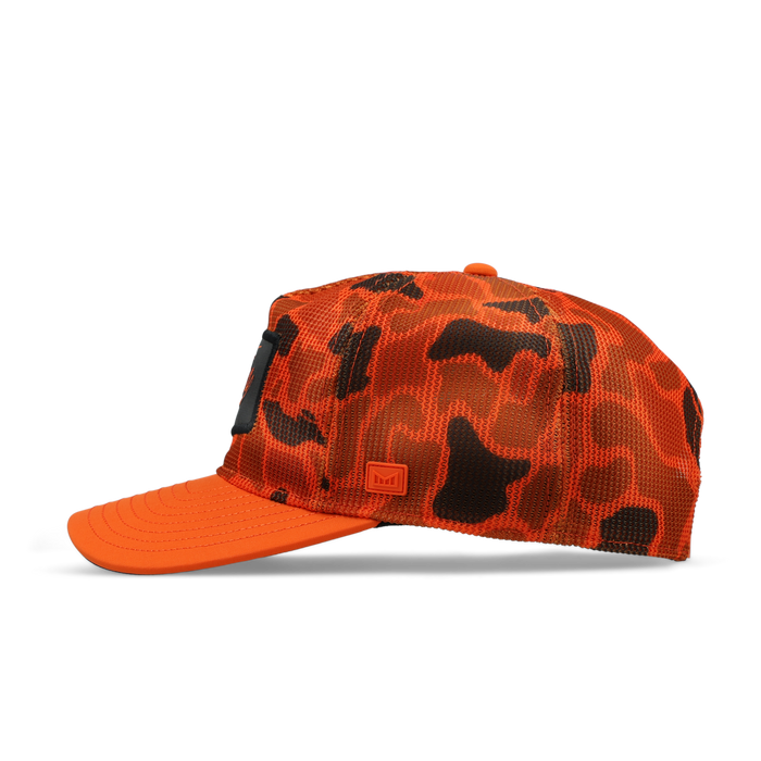 The side view of the melin Split Fit Odysea Retro Hydro hat in safety orange
