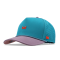 Turquoise and pink baseball cap with red bull logo and perforated panels on back.