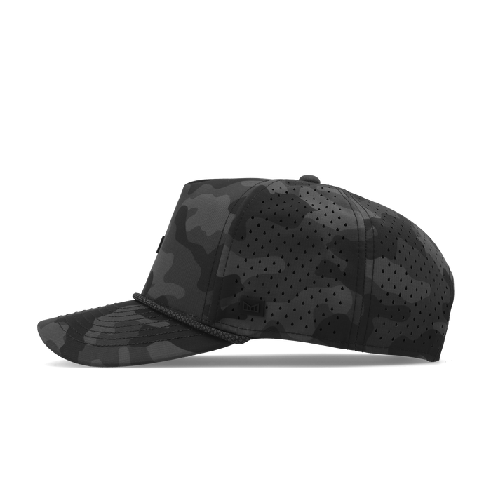 Black camo baseball cap with perforated mesh panels and rope trim detail on visor.
