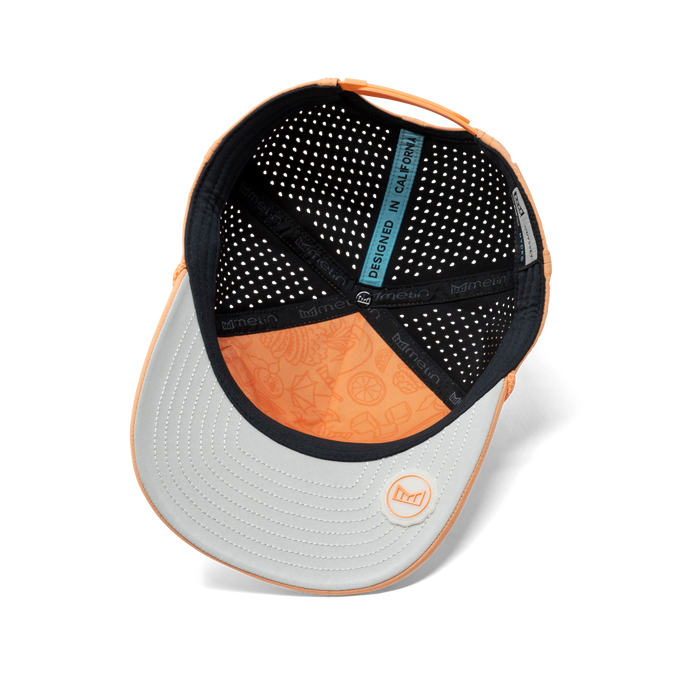 The inside view of the melin Odysea Rope Bulls Icon Hydro  Split Fit in  Cantaloupe Cooler