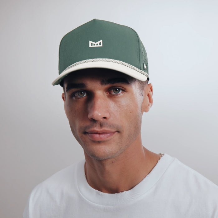 The model-image of melin's Odysea Rope Bulls Icon Hydro hat - Misty Trails
