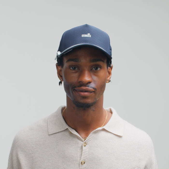 The model-image of the melin Split Fit Odysea Rope Links Hydro hat in navy