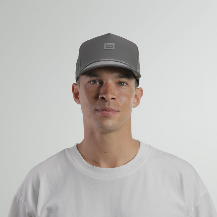 The model-image of the melin Split Fit Odysea Rope Streamline Hydro hat in raven
