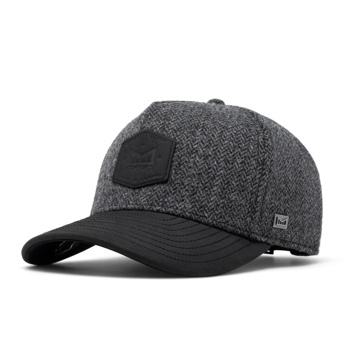 The front, angled view of the melin Odysea Scout Thermal  Split Fit in Charcoal / Herringbone