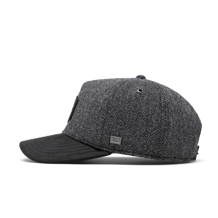 The side view of the melin Odysea Scout Thermal  Split Fit in Charcoal / Herringbone