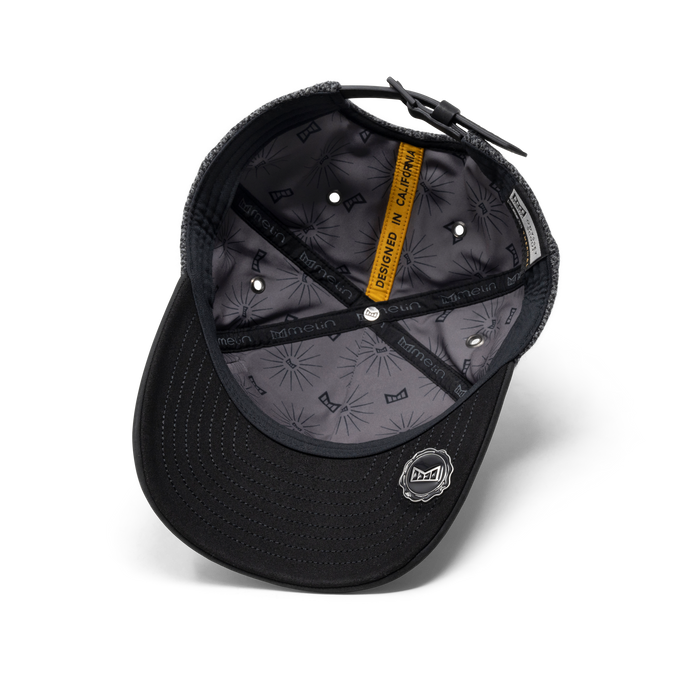 The inside view of the melin Odysea Scout Thermal  Split Fit in Charcoal / Herringbone