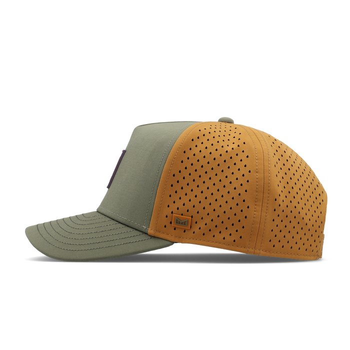 The side view of the melin Split Fit Odysea Stacked Hydro hat in transit