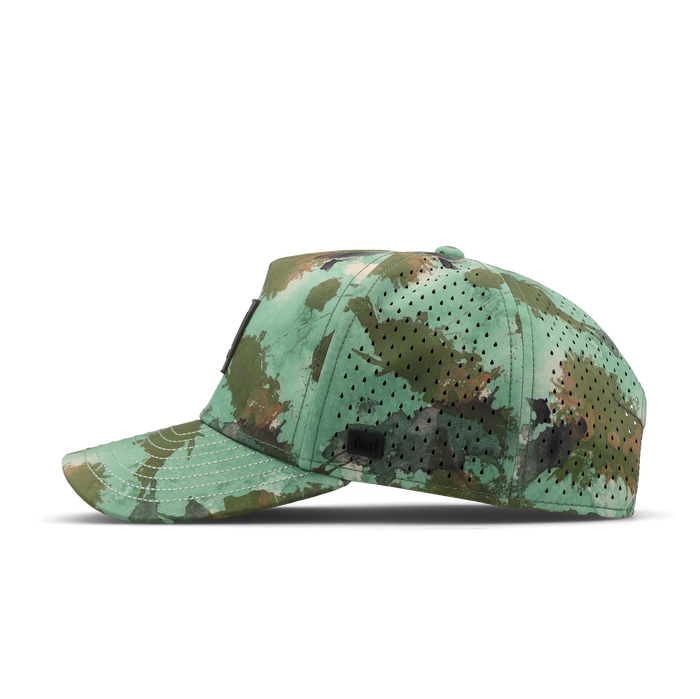 The side view of the melin Split Fit Odysea Stacked Hydro hat in watercolor camo