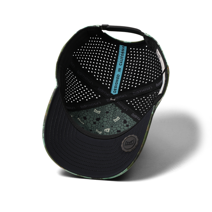 The inside view of the melin Split Fit Odysea Stacked Hydro hat in watercolor camo