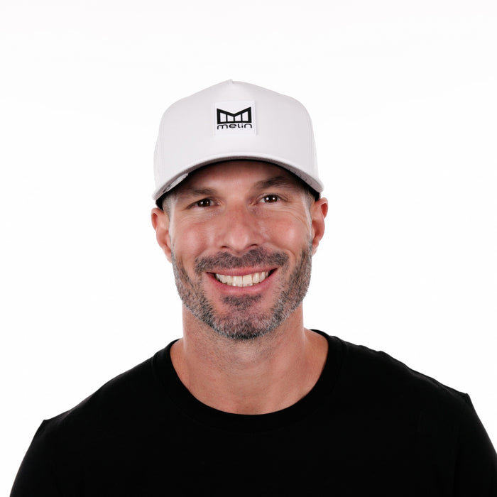 The model-image of the Melin Split Fit Odysea Stacked Hydro hat in white