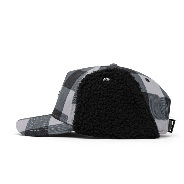 Black and white plaid baseball cap with black fleece lining and stacked crown design.