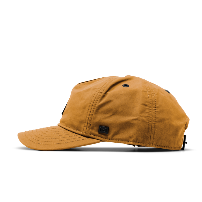 The side view of the melin Odysea Stacked Thermal  Split Fit in  British Khaki
