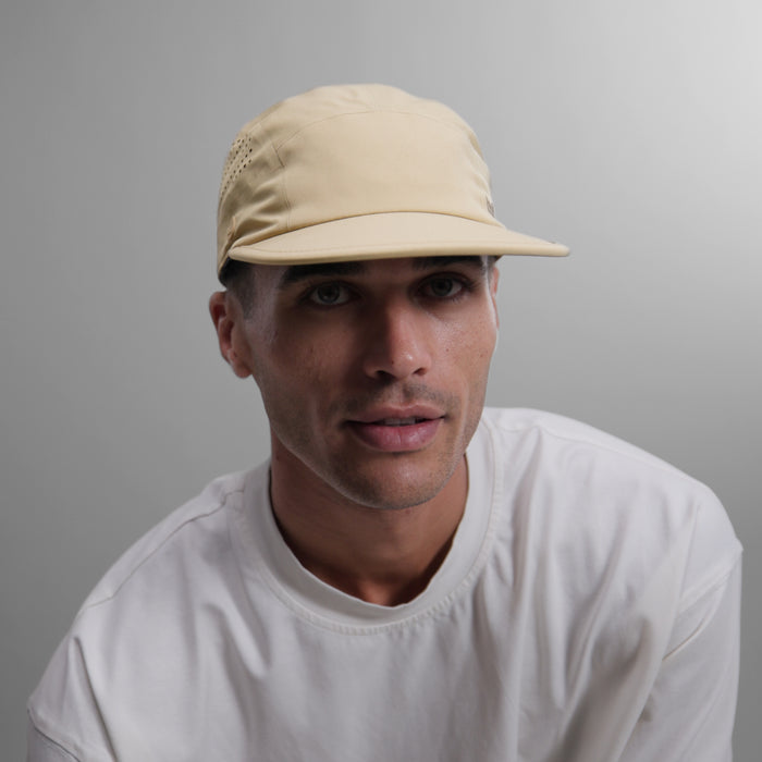 The model-image view of the melin Camper Fit Pace Hydro VO2 hat in Incense