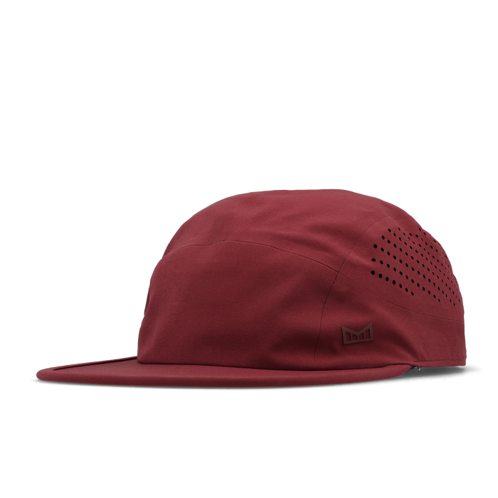 The angled view of the melin Pace Hydro VO2 hat in Tawny Port