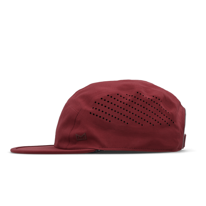 The side view of the melin Pace Hydro VO2 hat in Tawny Port