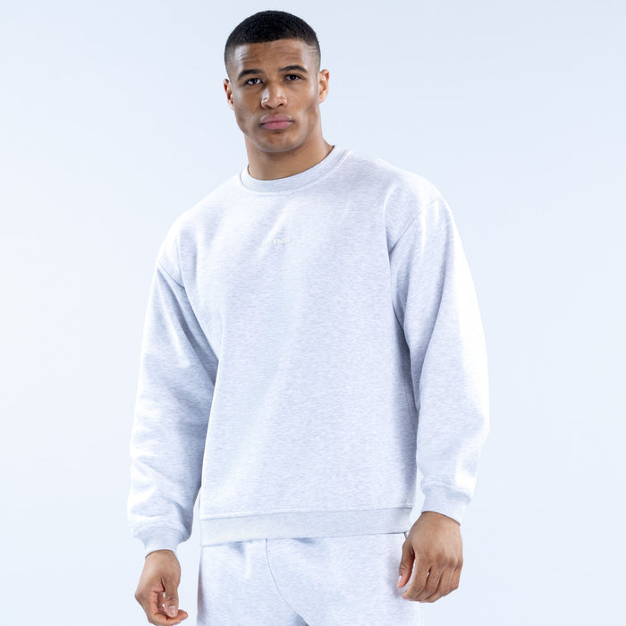 Light heather gray crewneck sweatshirt with long sleeves and ribbed cuffs