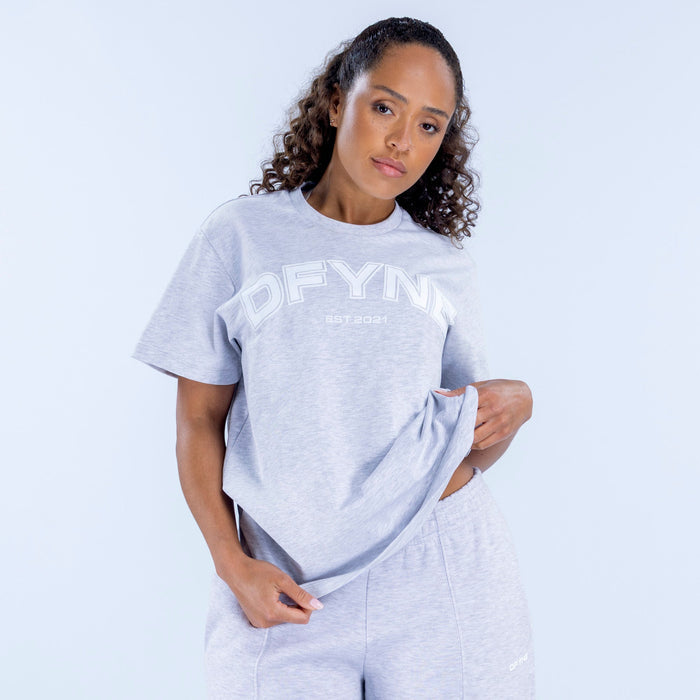 Light gray oversized graphic T-shirt with crew neck and short sleeves, front print