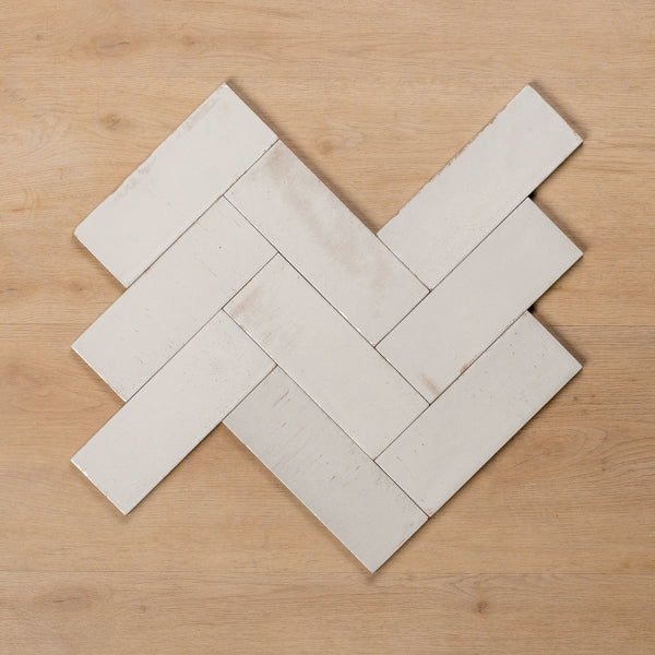 Sicily Bianco White Gloss Cushioned Edge Porcelain Tile 75x200mm Herringbone Pattern - The Blue Space