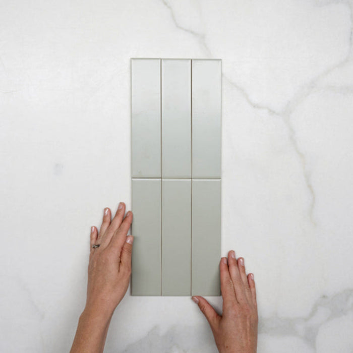 Hero WIth Hand Sunset Sage Avocado Satin Flat Ceramic Tile 50x200mm  - The Blue Space