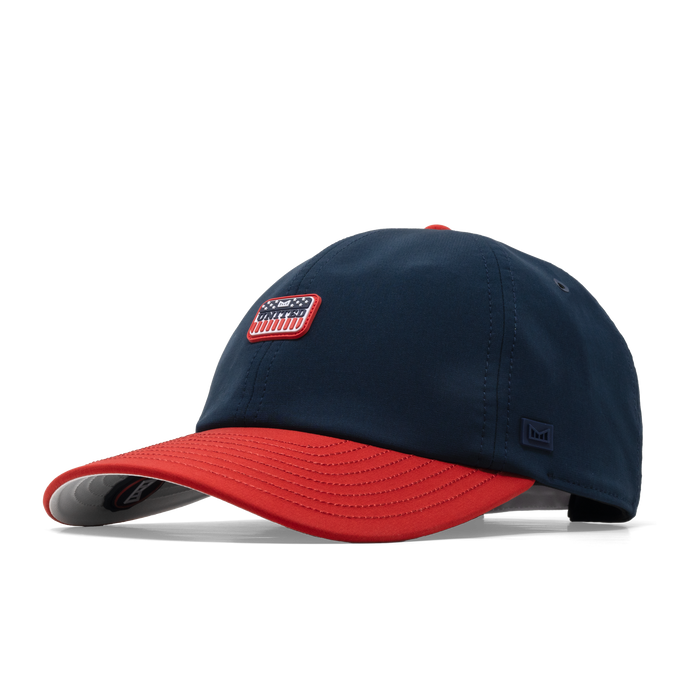The angled view of the melin The Legend Americana Hydro Performance Dad Hat in white / red / navy