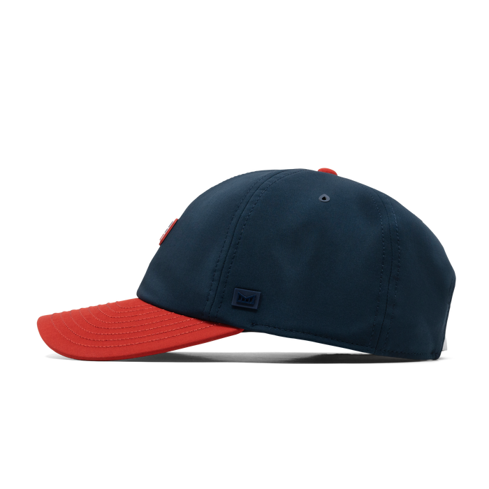The side view of the melin The Legend Americana Hydro Performance Dad Hat in white / red / navy