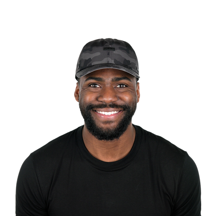 The model-image of the Melin Legend Hydro hat in Black Camo