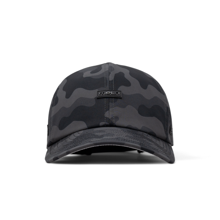 The front view of the melin The Legend Hydro  Performance Dad Hat in  Black Camo