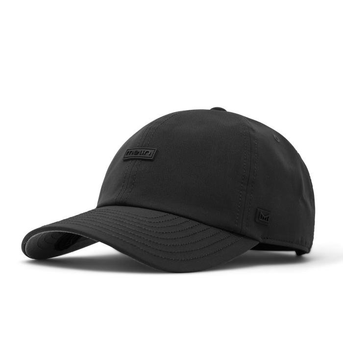The front, angled view of the melin The Legend Hydro  Performance Dad Hat in  Black