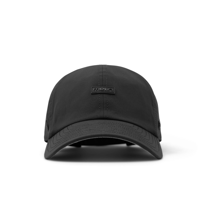 The front view of the melin The Legend Hydro  Performance Dad Hat in  Black