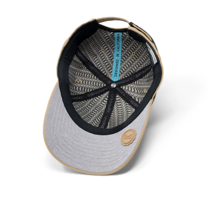 The inside view of the melin The Legend Hydro Performance Dad Hat in dark khaki