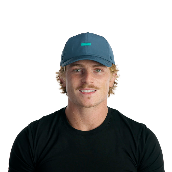 The model-image view of the melin Performance Dad Hat The Legend Hydro  in Deep Dive