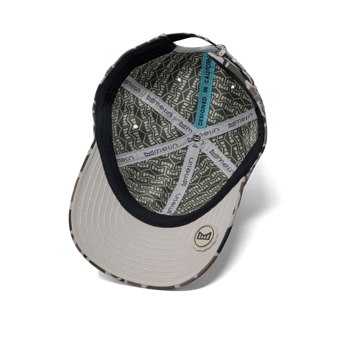 The inside view of the melin The Legend Hydro Performance Dad Hat in duck camo