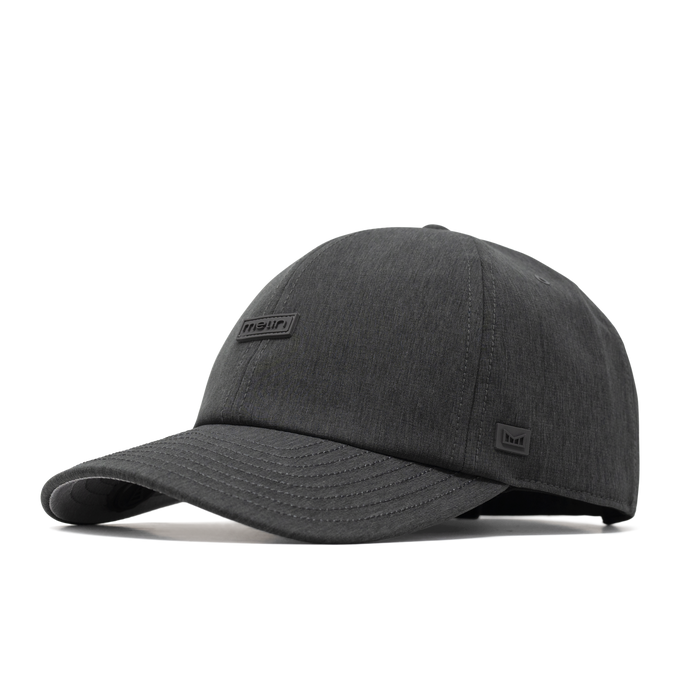 The front, angled view of the melin The Legend Hydro  Performance Dad Hat in  Heather Charcoal