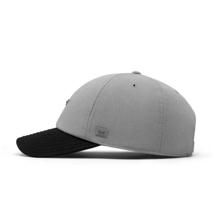 The side view of the melin The Legend Hydro  Performance Dad Hat in Heather Grey / Black