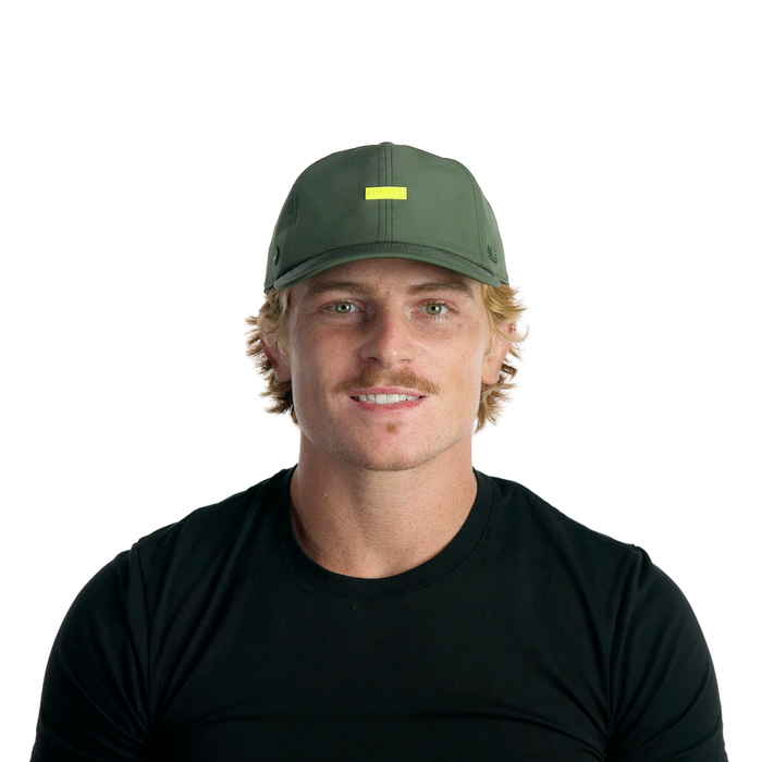 The model-image view of the melin Performance Dad Hat The Legend Hydro in Kombu Green