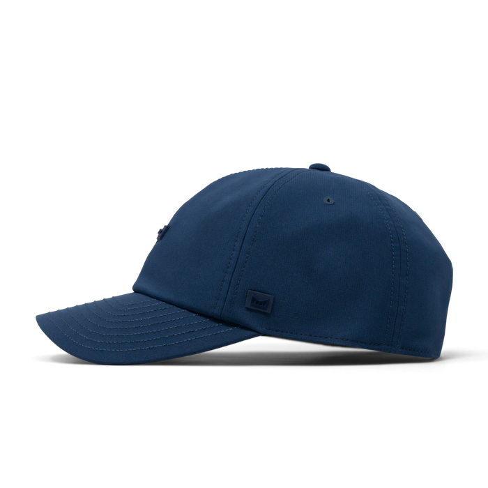 The side view of the melin The Legend Hydro Performance Dad Hat in navy
