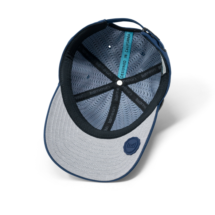 The inside view of the melin The Legend Hydro Performance Dad Hat in navy