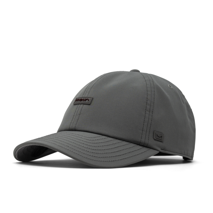 The front, angled view of the melin The Legend Hydro  Performance Dad Hat in  Pewter