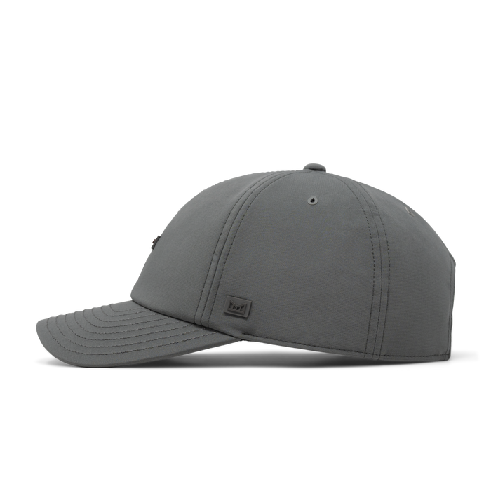 The side view of the melin The Legend Hydro  Performance Dad Hat in  Pewter