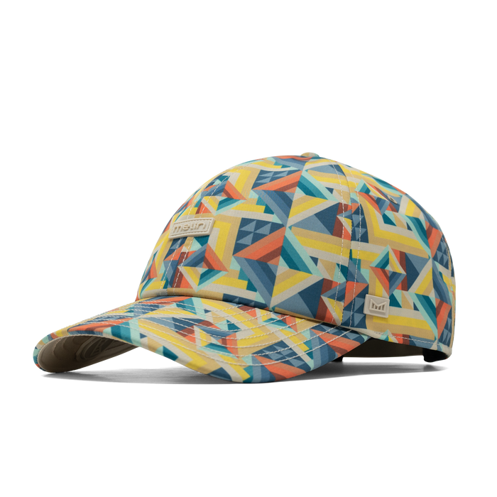 The front, angled view of the melin Performance Dad Hat The Legend Hydro  in  Prismatic
