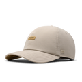 The front, angled view of the melin The Legend Hydro Performance Dad Hat in Sandshell